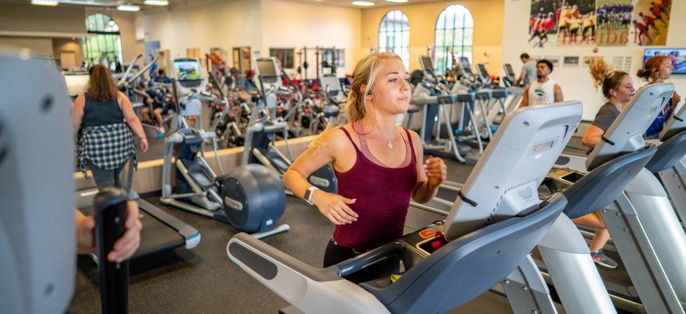 Student running on treadmill